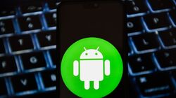 In this photo illustration a Android logo seen displayed on