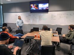 Tiling BoF in Brno during the HDR hackfest. Left to right: Robert Mader, Marco Trevisan, Georges Stavracase, Jakub Steiner and Allan Day (remote), Florian Müllner, Jonas Dreßler