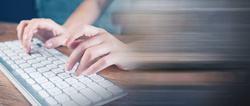 young woman typing keyboard