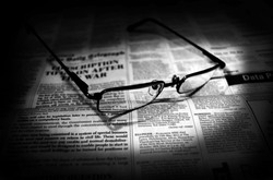 Newspapers And Glasses