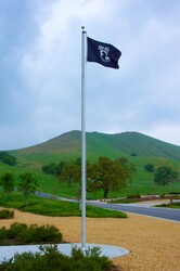 POW MIA Flag Above Cemetery: Prisoner of War and Missing in Action Flag waves above Bakersfield National Cemetery.