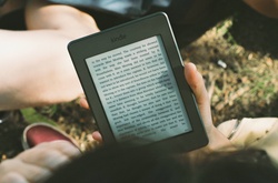 Hand holding an ebook reader