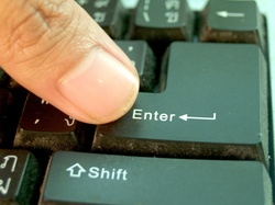 Worker Typing On The Keyboard