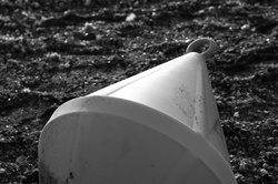 Buoy On The Beach At The Black Sea