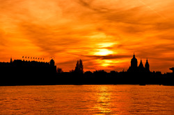 Orange sunset with Amsterdam silhouette