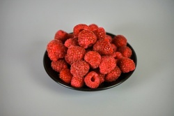 Raspberries In A Bowl