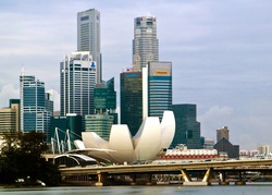 Singapore Raffles Place financial district with the ArtScience Museum in the foreground