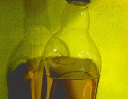 Olive oil bottle in sunlight