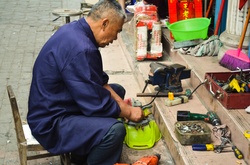 Man fixing broken equipment