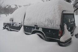 Truck covered with snow