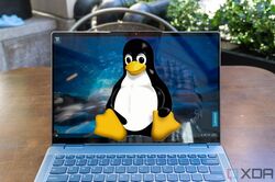 Tux at the top of a laptop