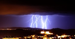 Huge lightning storm over city Sibenik, Croatia at night