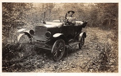 Dandy on autumn tour with his car in the forest Artist Unknown year ca 1920 Public Domain