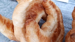 Butter croissant in plastic packaging