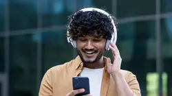 a guy wearing headphone