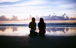 Women Watching the Ocean Waves
