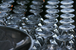 Lined up and overturned wine glasses, preparation before a party