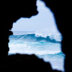 Huge waves through a rock window