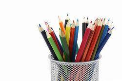 Colored pencils in pencil holder 