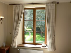 Books placed on an interior window sill or stool