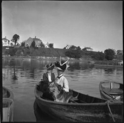 Jessica Lewis in boat. Also picture of sailboat. October 1900.