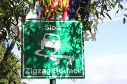 Zigzag road sign
