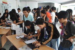 Students lined up to register at the Software Freedom Day 2011 event in the University of Santo Tomas, Manila, Philippines