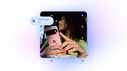 a woman holding a google phone