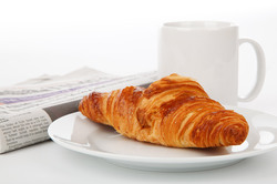 Croissant Newspaper And Tea
