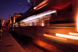 A moving tram at night in Eastern Europe