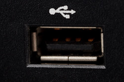 Closeup photo of a black USB connector