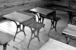 Antique wooden school desk in black and white
