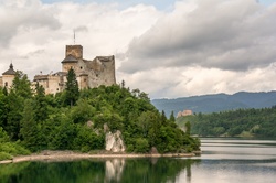 View of the castle in Niedzica and the river