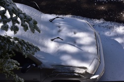 Snow covered car
