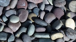 Smooth river rocks in multiple colors