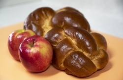 Fall food in celebration of Jewish New Year, apples and challa braided bread