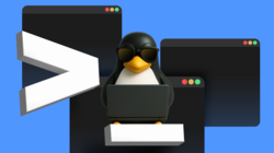 Tux working on a computer wearing sunglasses