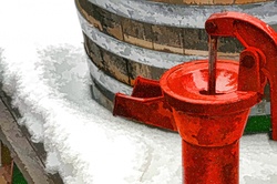 Red vintage spout in snow