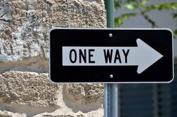 One way sign on street